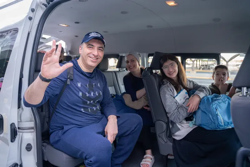 Guests being welcomed aboard their airport transfer in Panama